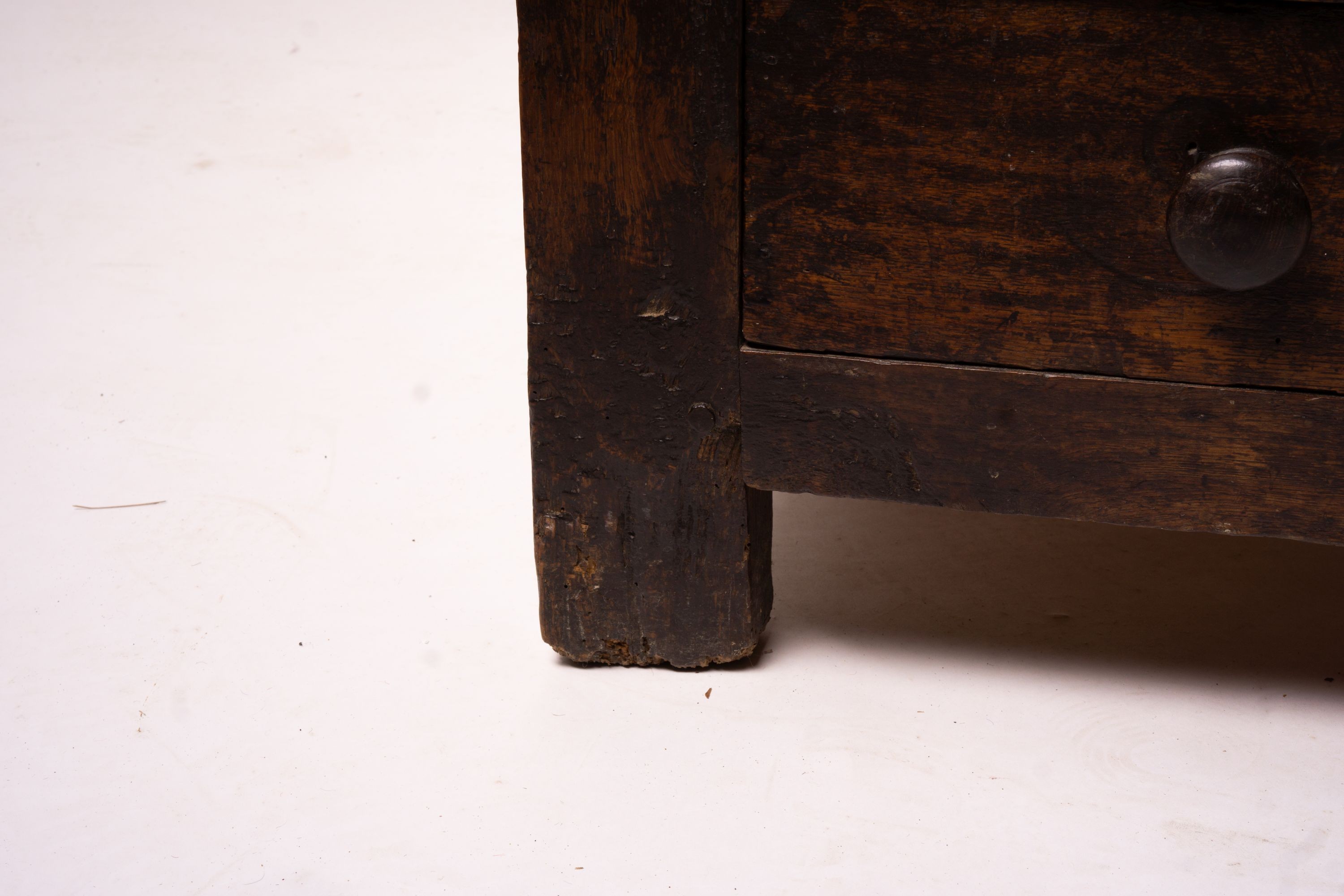 An 18th century panelled oak mule chest, length 161cm, depth 61cm, height 84cm